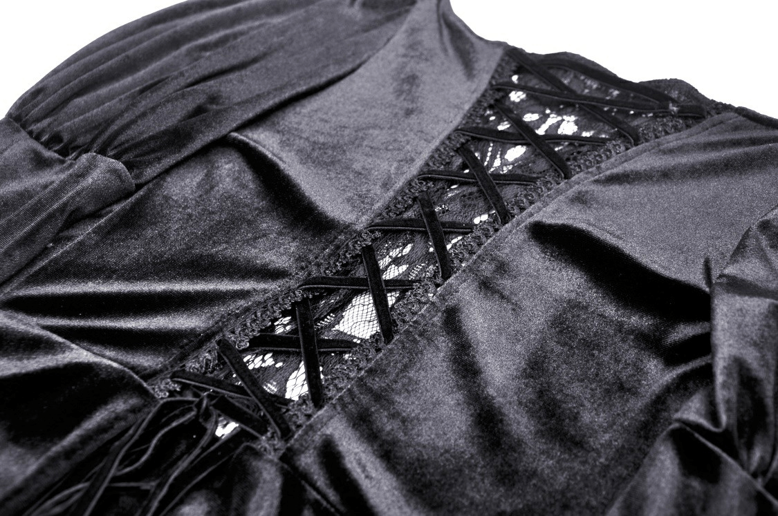 Close-up of elegant black lace Victorian gown's intricate embroidery and lace details, showcasing gothic charm.