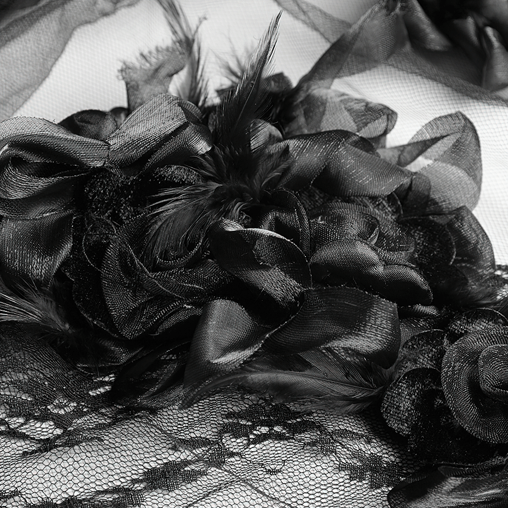 Elegant black lace with 3D roses and feathers, perfect for a gothic wedding veil or dramatic bridal look.