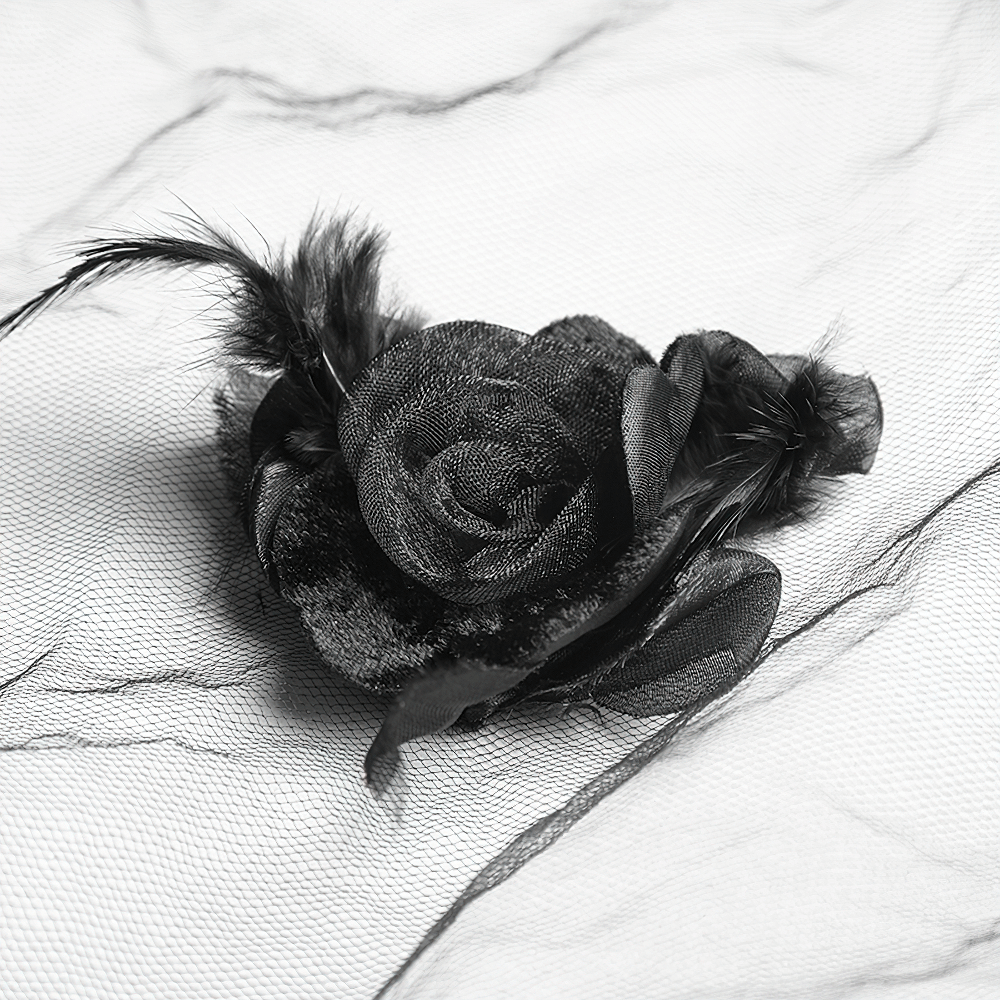 Elegant black lace flower accent with feathers, perfect for gothic style wedding accessories.