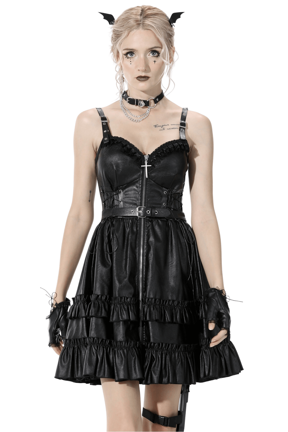 Elegant black leather dress with ruffled layers and adjustable straps, perfect for bold evening statements.