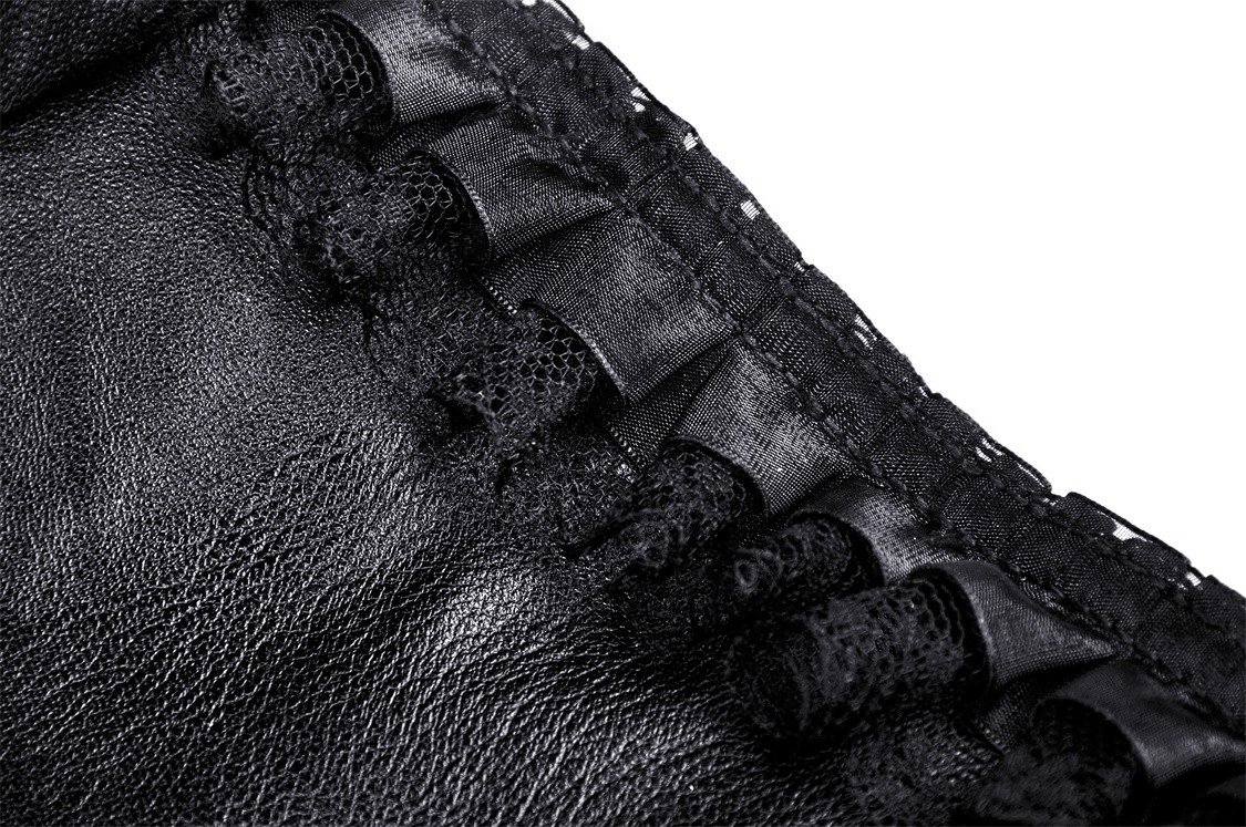 Close-up of black leather fabric showcasing ruffled layers and intricate lace detailing for a stylish ruffle dress.