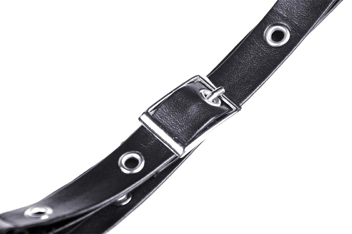 Close-up of a stylish black leather belt with silver buckle and eyelets, perfect for enhancing any outfit.
