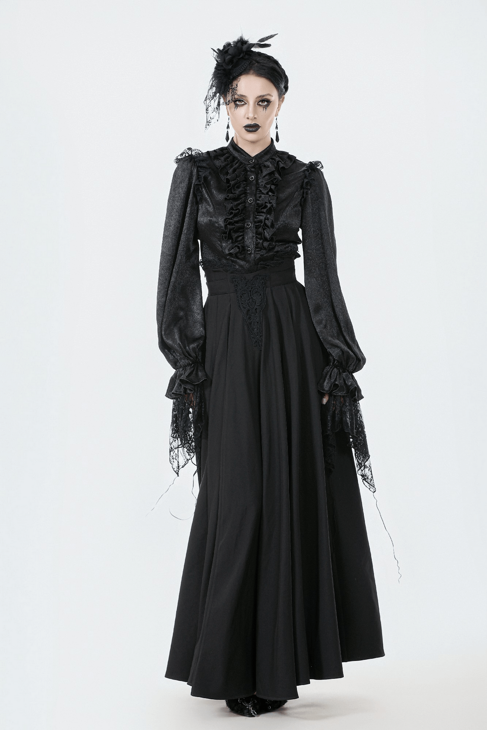 Elegant Black Maxi Skirt with Lace Back and Bow Detail worn by a model in a gothic setting.