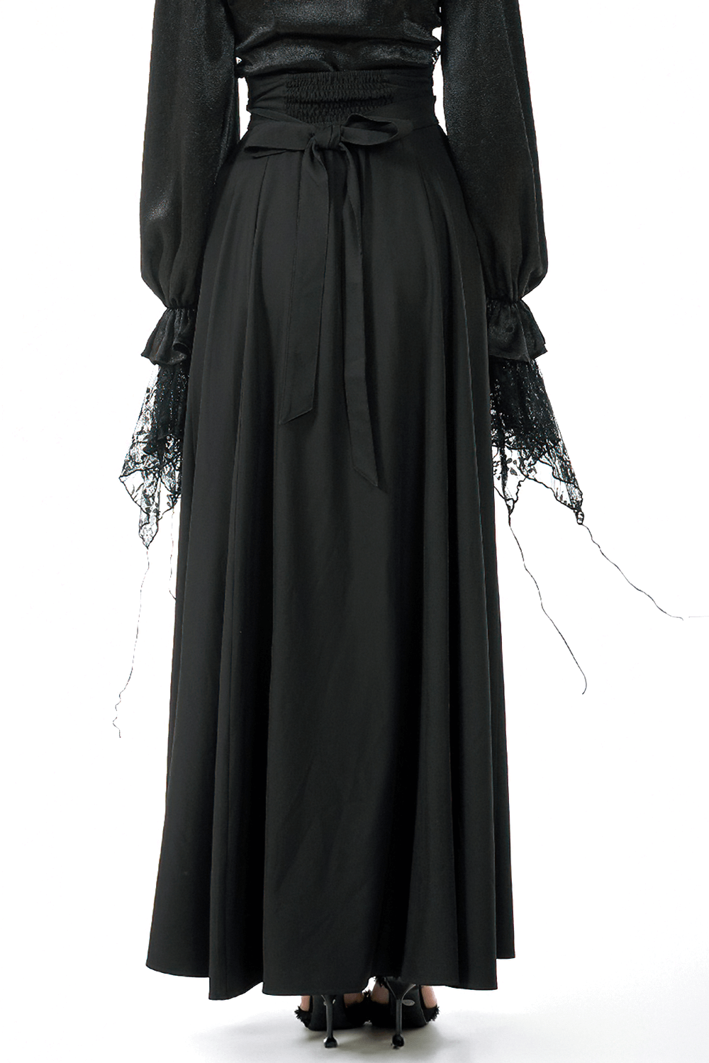Elegant Black Maxi Skirt with Lace Back and Bow Detail showcasing its beautiful back design.