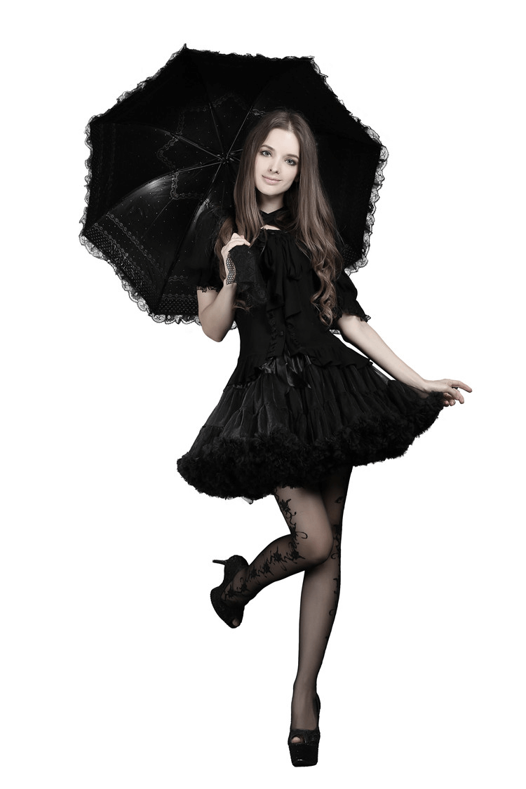 Chic young woman in a black layered dress holding a black lace umbrella, styled elegantly.