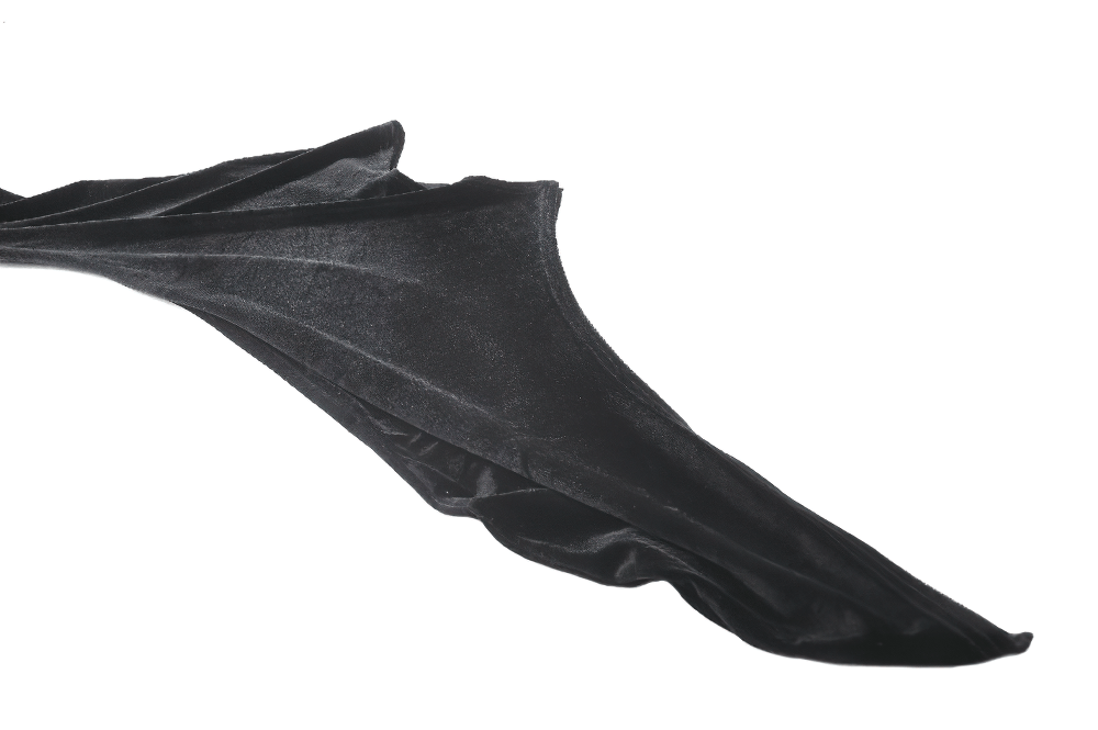 Flowing black velvet fabric showcasing the soft texture and elegance of gothic style attire.