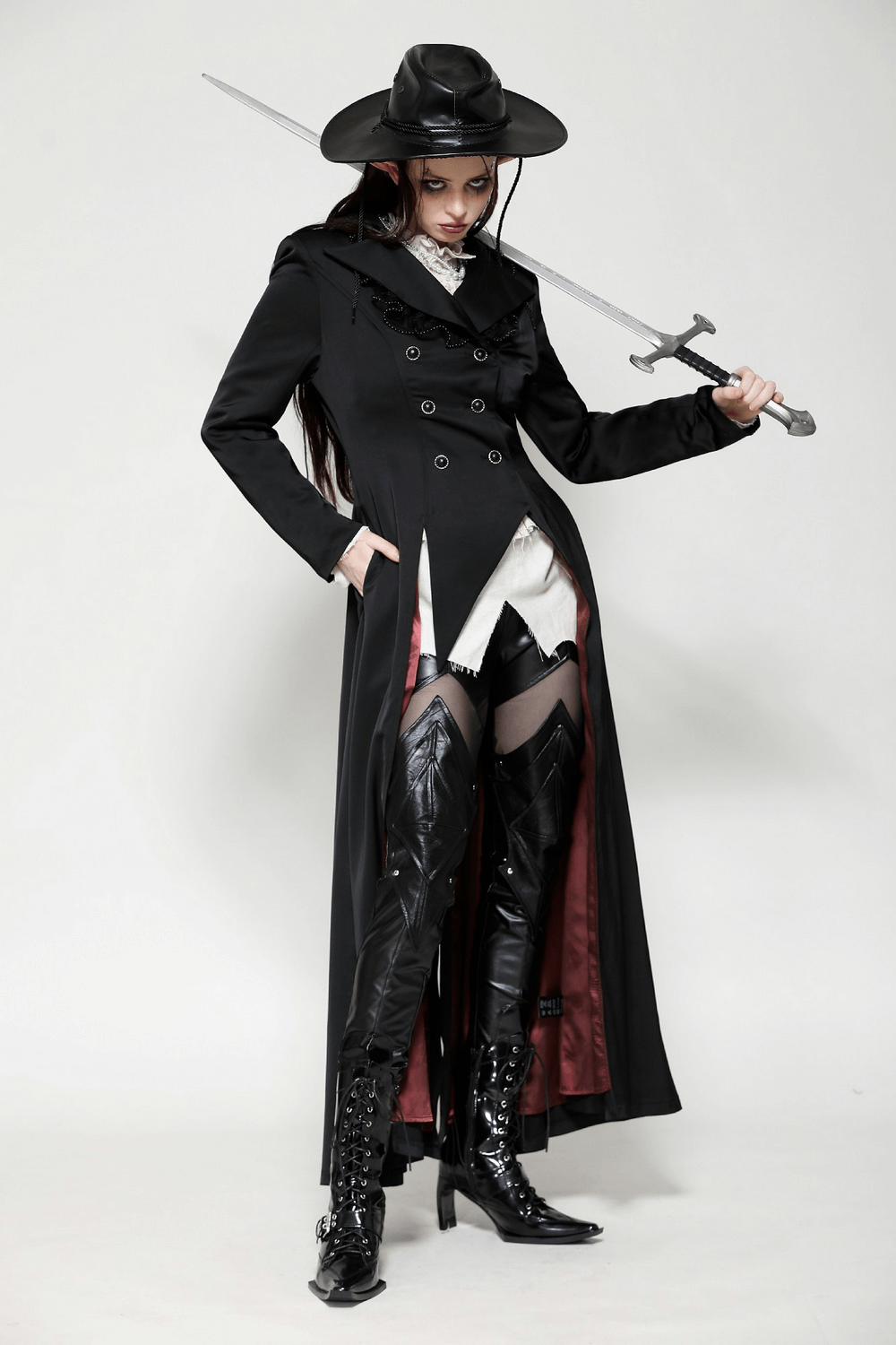 Elegant black Victorian-inspired coat with satin details, perfect for gothic fashion and steampunk style.