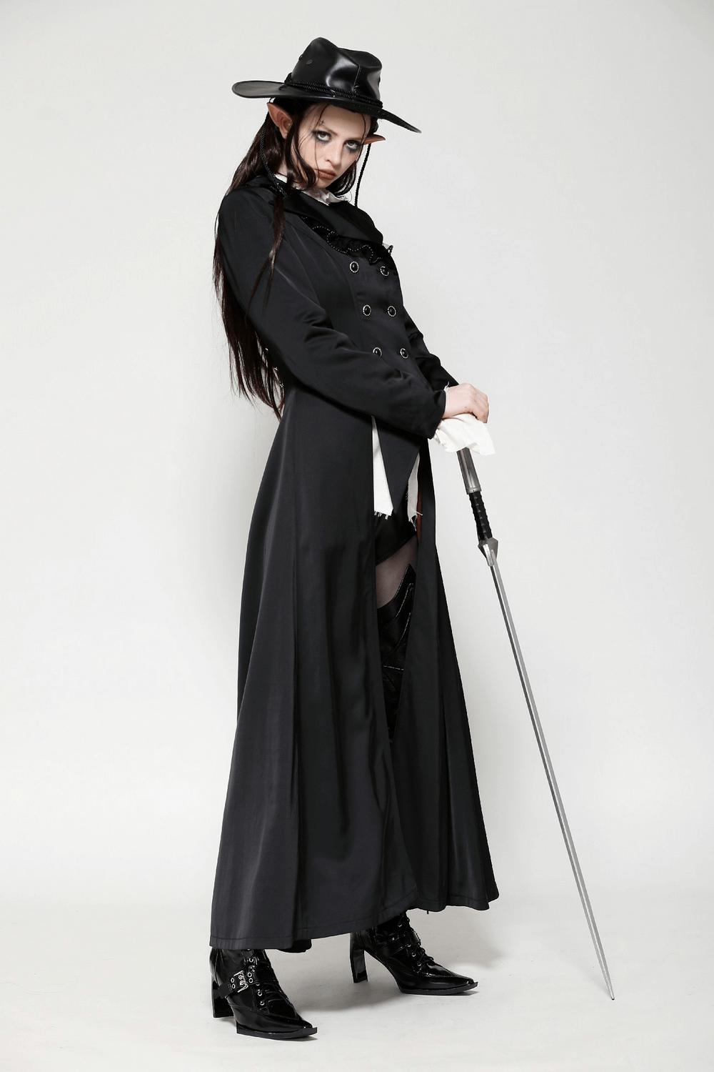 Elegant black Victorian-inspired coat with satin details, featuring a dramatic style and double-breasted design for gothic fashion.