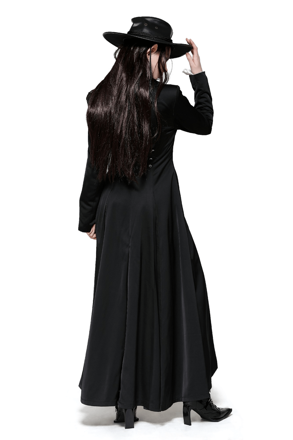 Back view of an elegant black Victorian-inspired long coat paired with a stylish hat and high-heeled boots.