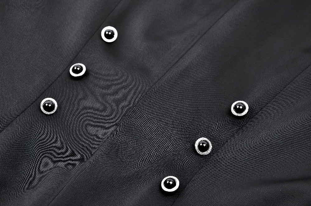 Close-up of elegant black fabric with shiny buttons, showcasing Victorian-inspired design details.