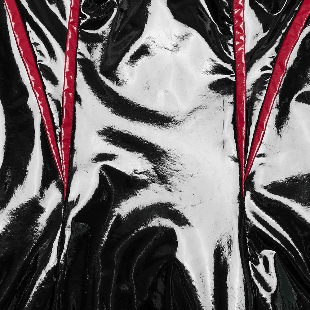 Close-up of the glossy black vinyl dress showcasing sleek red accents and stylish slits for a bold punk look.