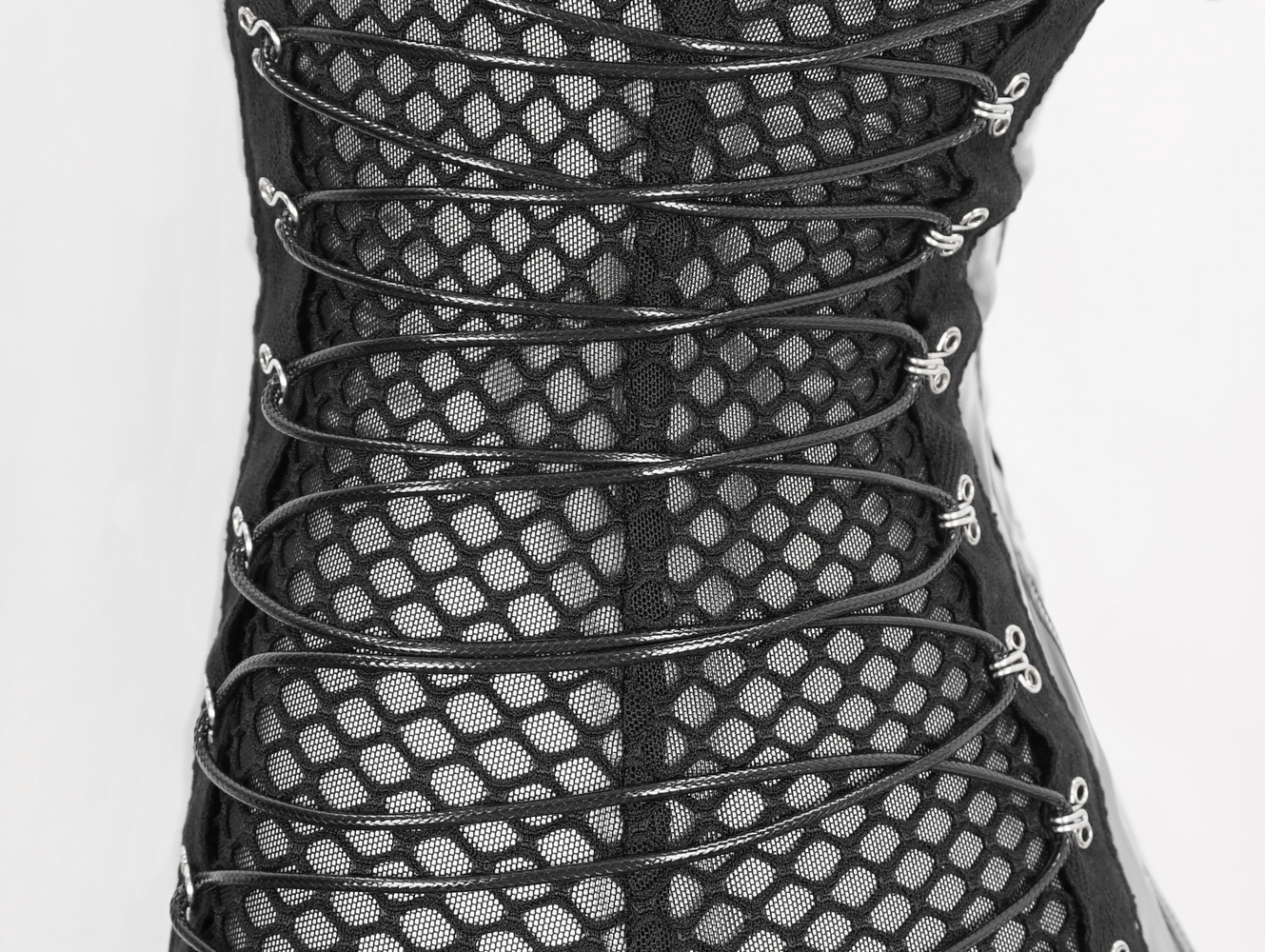 Close-up of a black lace-up detail on a stylish vinyl bodysuit, showcasing the customizable fit and eye-catching design.
