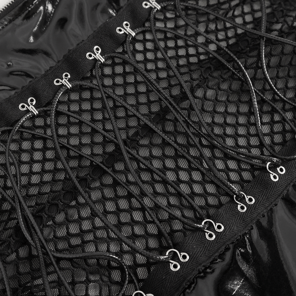 Close-up of black vinyl bodysuit lace-up front with mesh detailing for customizable fit.