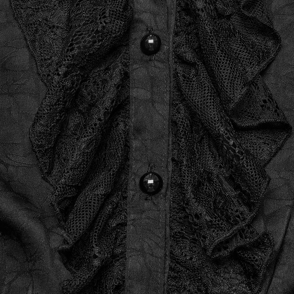 Close-up of elegant black lace blouse with ruffled details and glossy buttons, perfect for gothic fashion enthusiasts.
