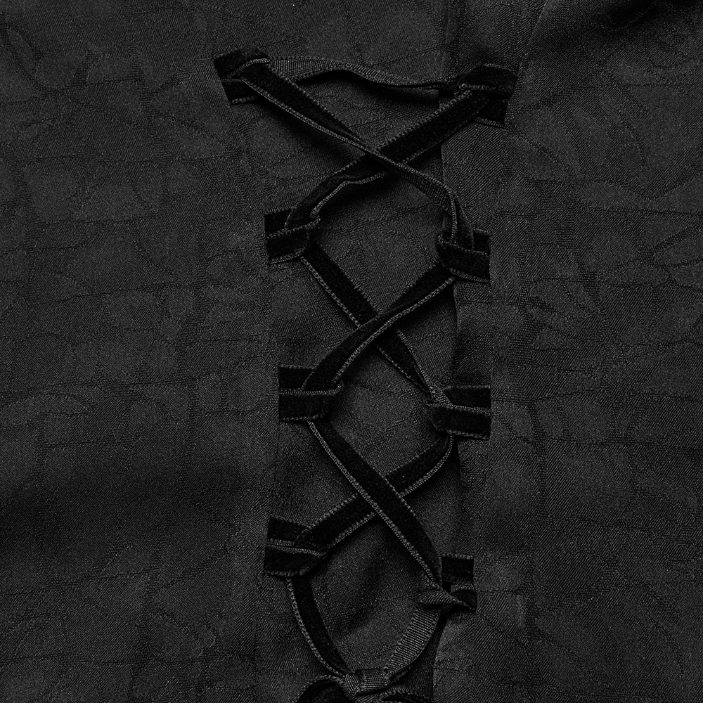 Close-up of the intricate lace-up detailing on an elegant black gothic blouse.