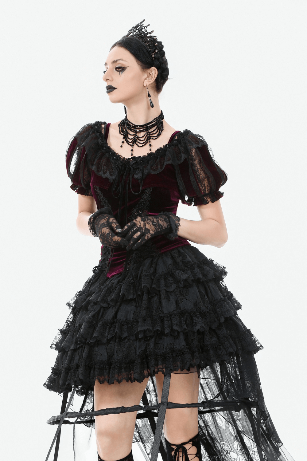 Burgundy Victorian bolero with black lace ruffles and dramatic gloves, embodying gothic elegance and dark romantic style.