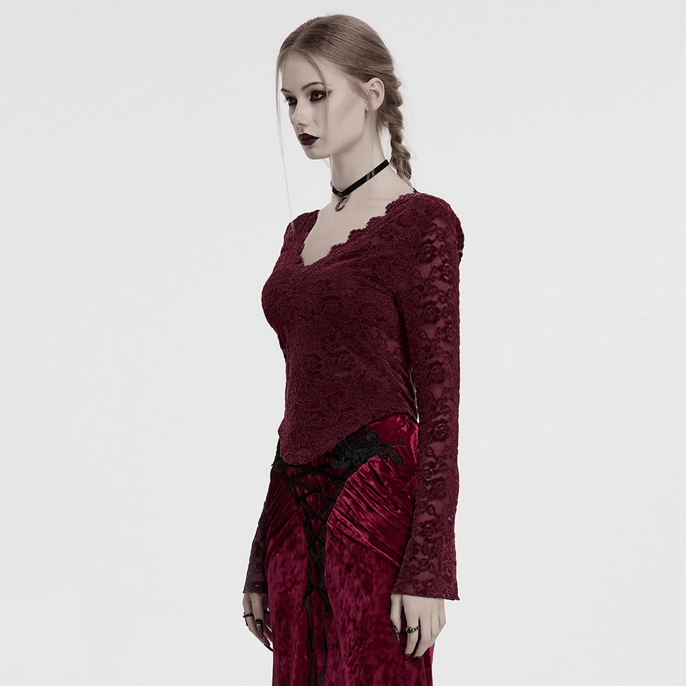 Elegant burgundy lace V-neck gothic long sleeve top with floral design and U-shaped hem.