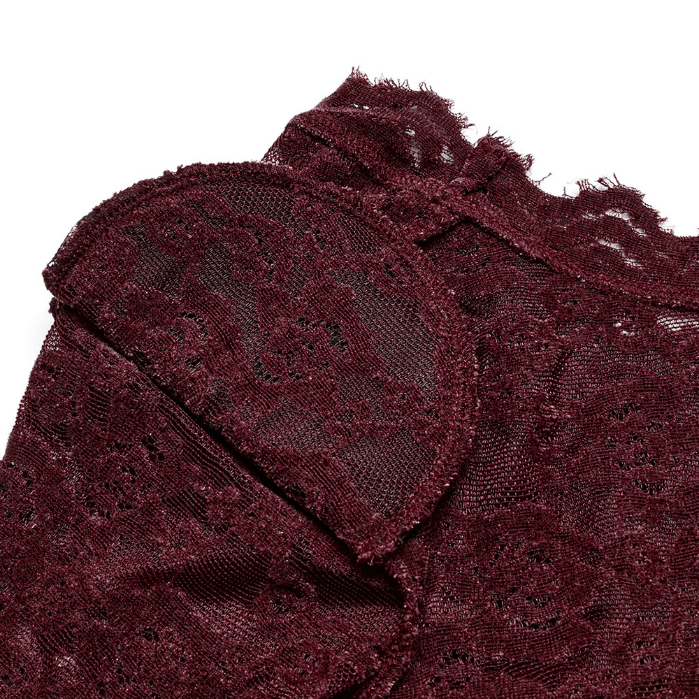 Close-up of elegant burgundy lace showing detailed floral patterns and soft texture, perfect for gothic style.