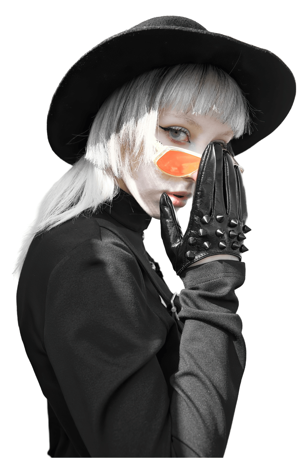 Model showcasing stylish black spiked punk half-hand gloves with a trendy hat and orange sunglasses.