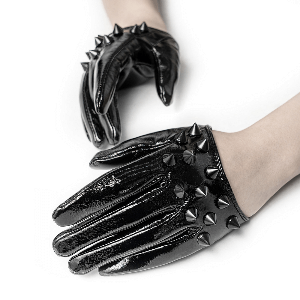 Elegant black spiked punk half-hand gloves with rivet studs for an edgy fashion statement.