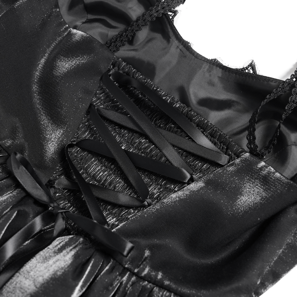 Close-up of elegant corset detailing with black satin and lace trim, perfect for gothic fashion lovers.
