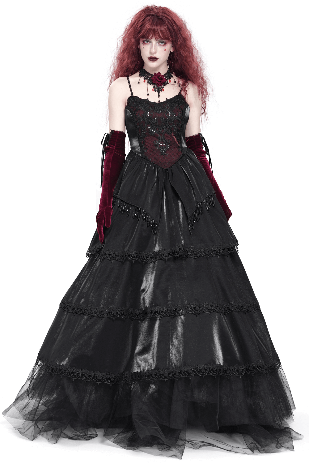 Elegant black corset maxi dress with lace layers and beaded accents, featuring dramatic gothic styling.