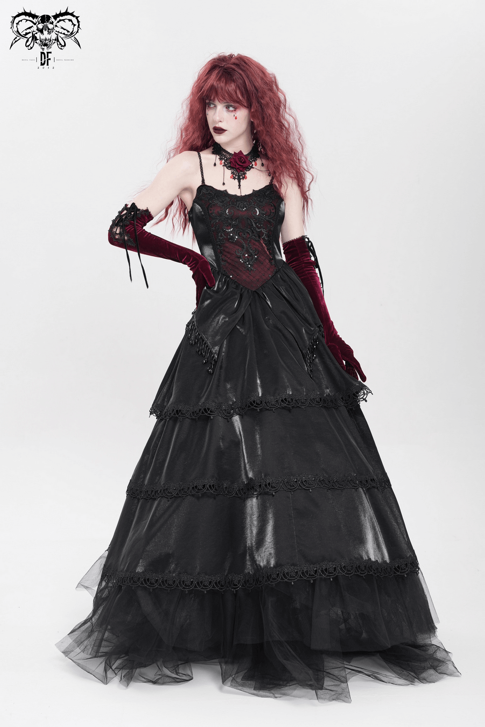 Elegant gothic corset maxi dress with lace layers and beaded trim, featuring a dramatic tiered skirt.