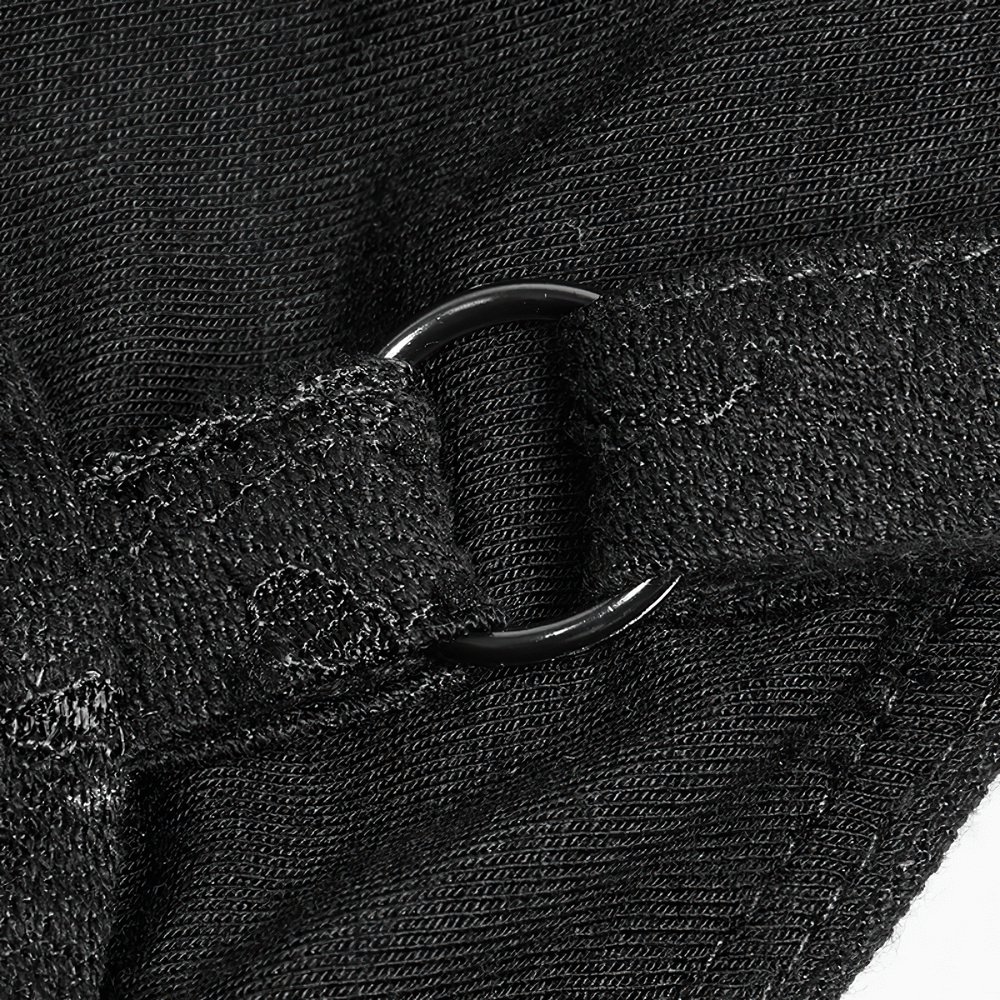 Close-up of a black strap detail with metal ring on a Gothic lace dress, perfect for edgy fashion enthusiasts.