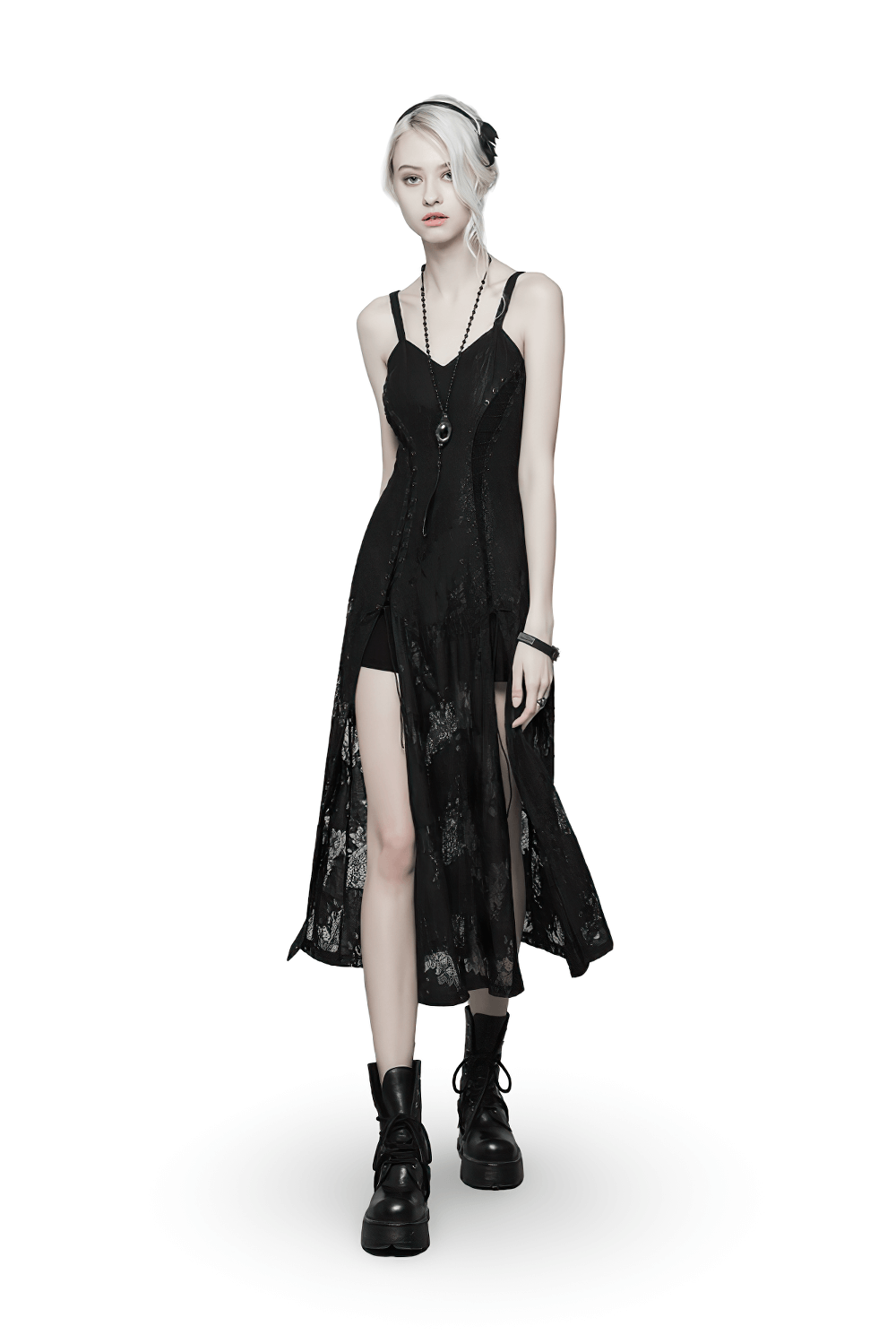 Model wearing an elegant dark Gothic lace strap backless dress paired with edgy boots and accessories.