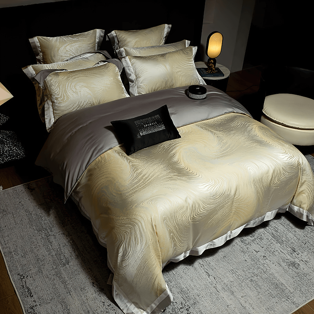 Elegant Egyptian Cotton Bedding Set with Marble Pattern displayed on a luxurious quilted bed with stylish pillows.