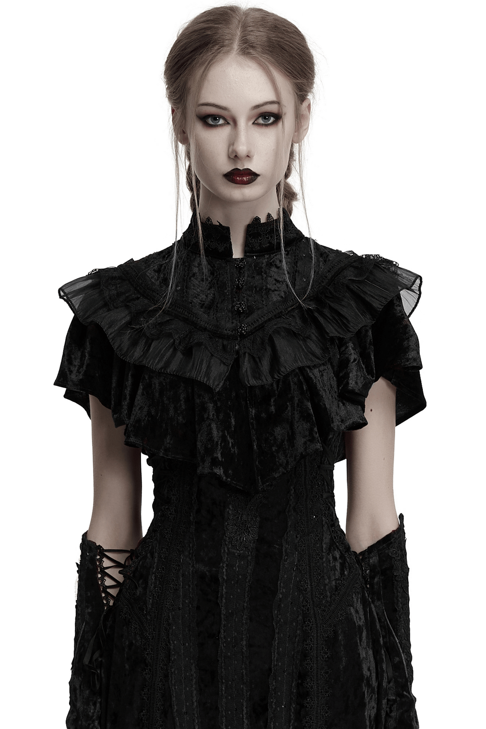 Elegant black velvet gothic blouse with ruffled collar and dramatic sleeves for a retro-inspired look.