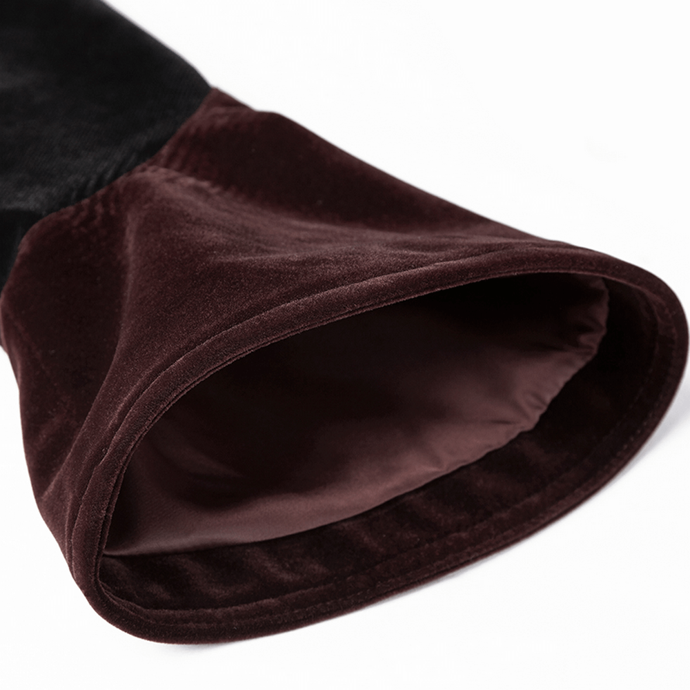 Close-up of the elegant burgundy velvet trumpet cuff from a Gothic tailcoat jacket.