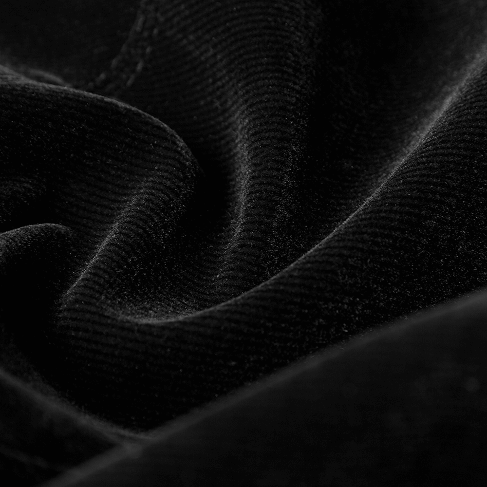 Close-up of luxurious black velvet fabric, showcasing rich texture and depth, perfect for gothic fashion.