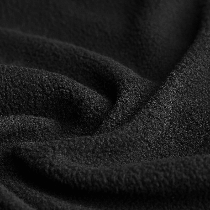 Close-up of luxurious black faux fur fabric, perfect for elegant gothic fashion and warm winter coats.