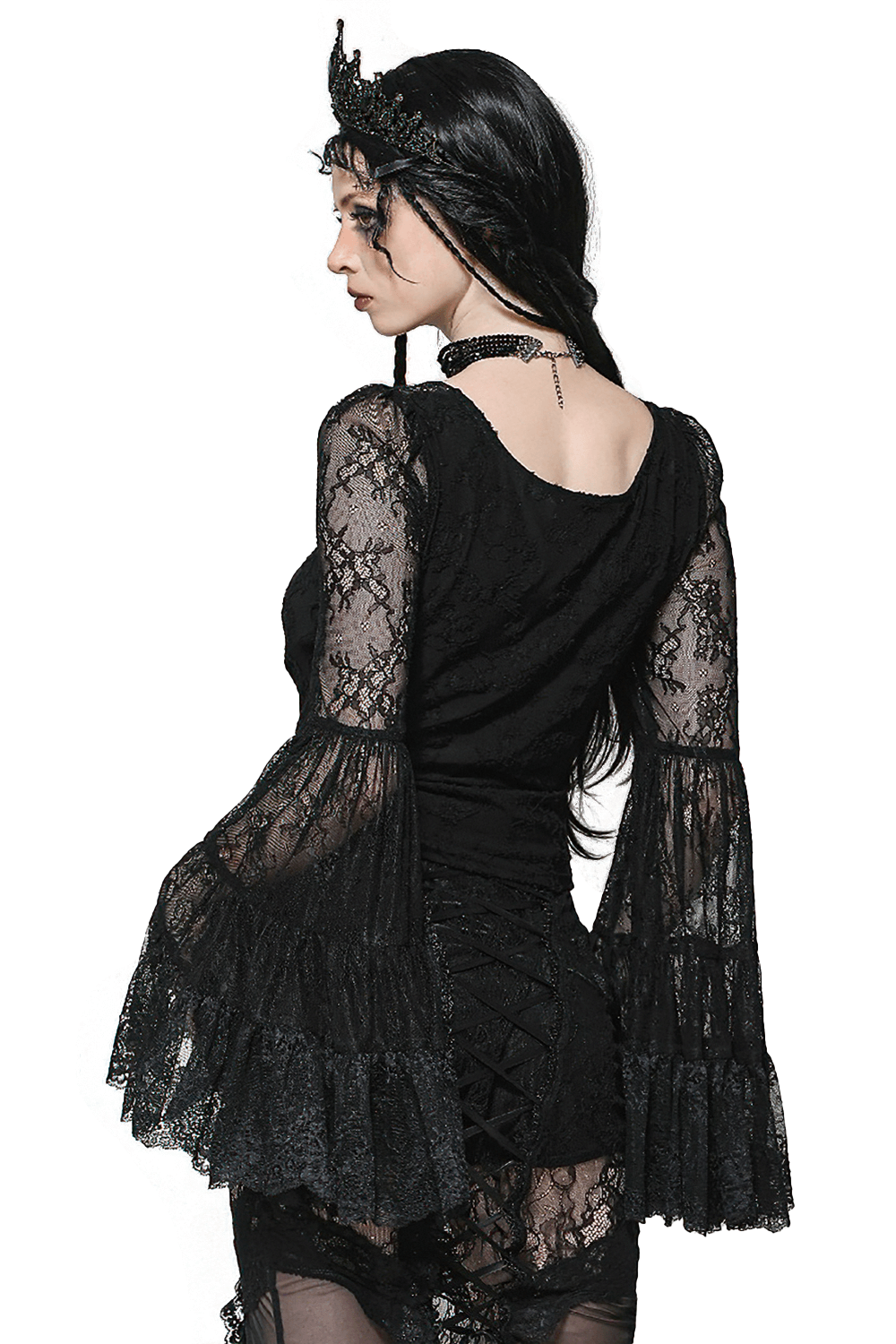 Elegant female model in a gothic black lace top with flared sleeves and a deep V-neck, showcasing vintage style.