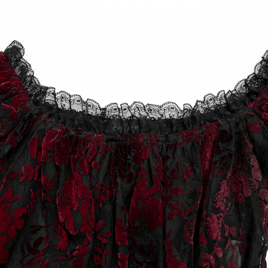Close-up of floral gothic crop top showing rich red floral pattern and elegant lace trim on elastic neckline.