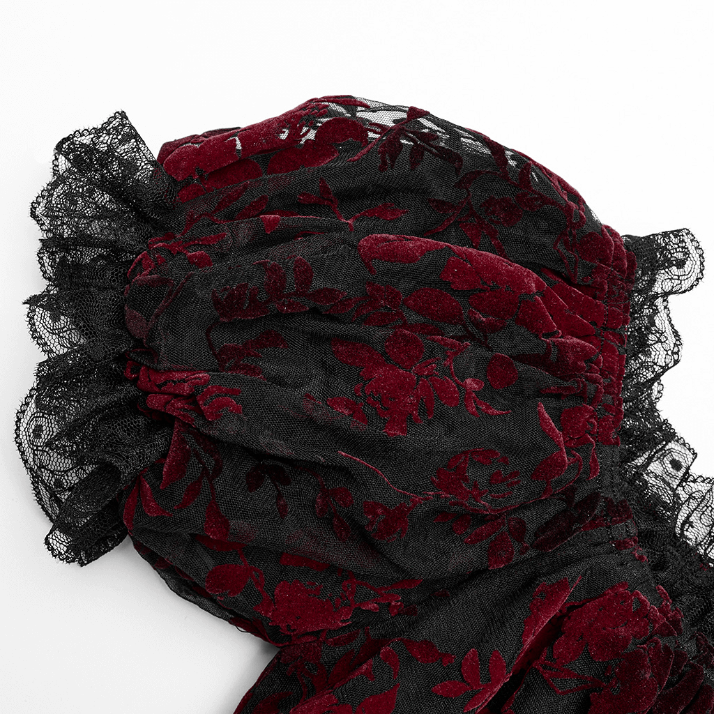 Elegant floral gothic flock mesh crop top with lace trim in rich red and black hues.