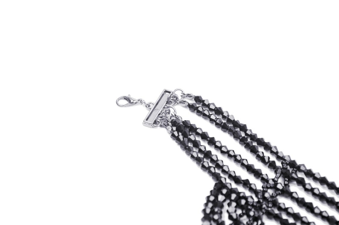 Elegant black glass beaded necklace with intricate design, perfect for evening glam.