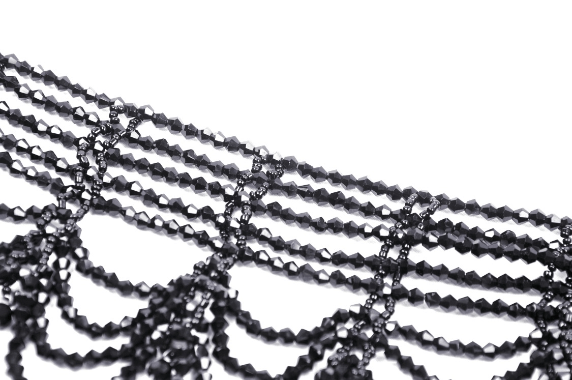 Elegant black beaded necklace showcasing intricate beadwork for evening glamour and stylish night outs.