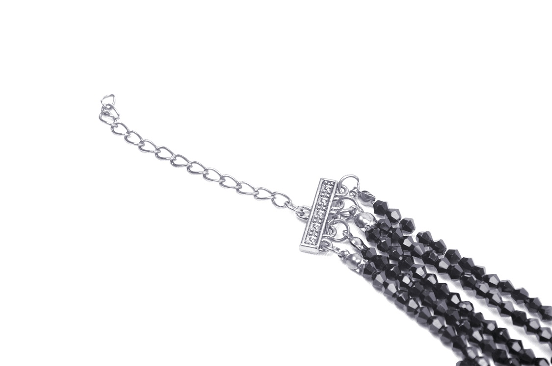 Elegant black beaded necklace with intricate choker design, perfect for evening wear and stylish night outs.