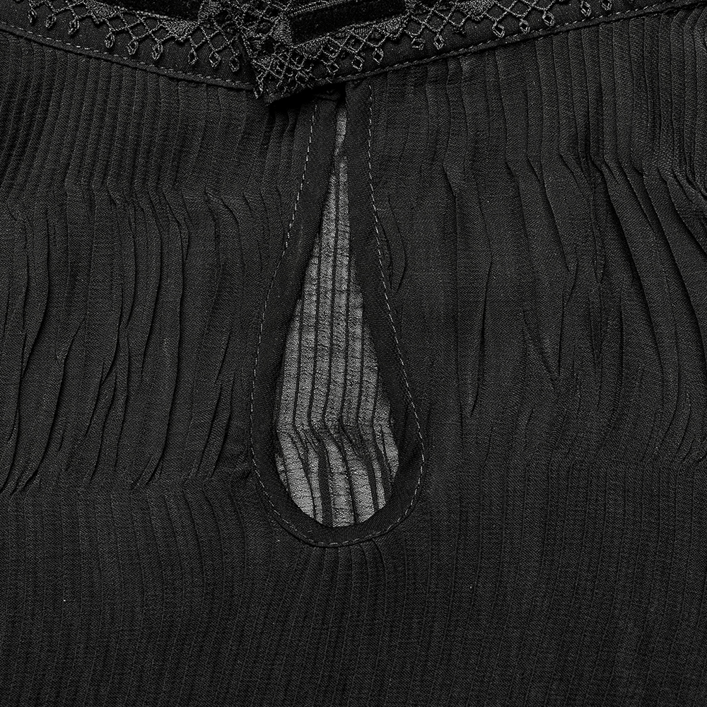 Close-up of textured black chiffon with lace collar details on goth shirt, showcasing unique crimped design.