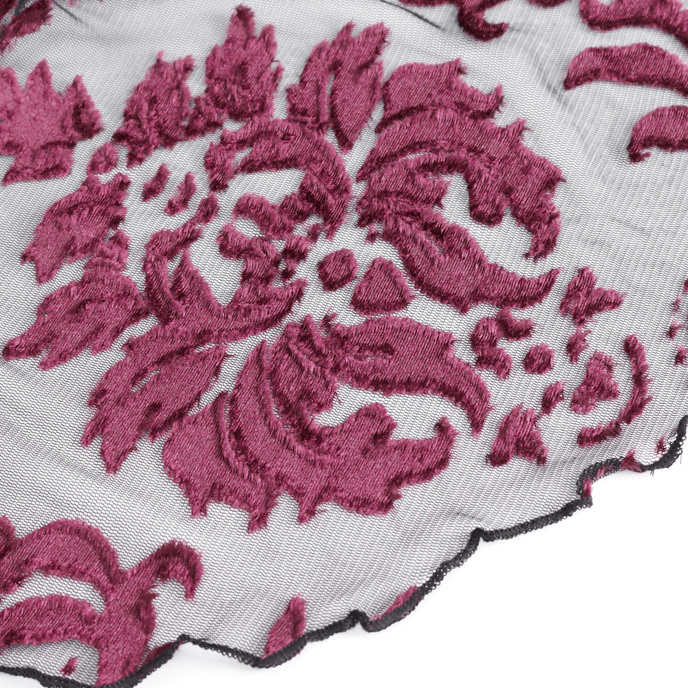 Close-up of elegant burgundy floral lace fabric with intricate embroidery details.