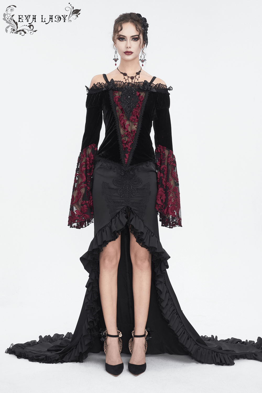 Elegant goth black velvet dress with lace sleeves and ruffled hem, perfect for special occasions.