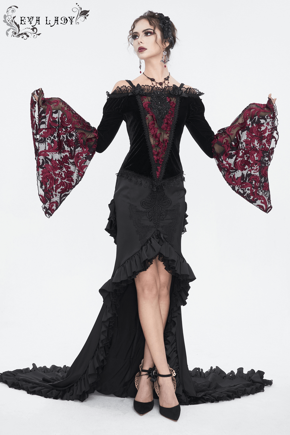 Elegant goth velvet top with lace bell sleeves, perfect for a dramatic night out or special occasion.