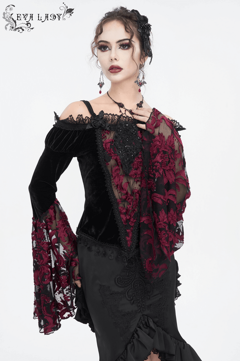 Elegant goth velvet top with lace long sleeves, perfect for a night out or special occasions.