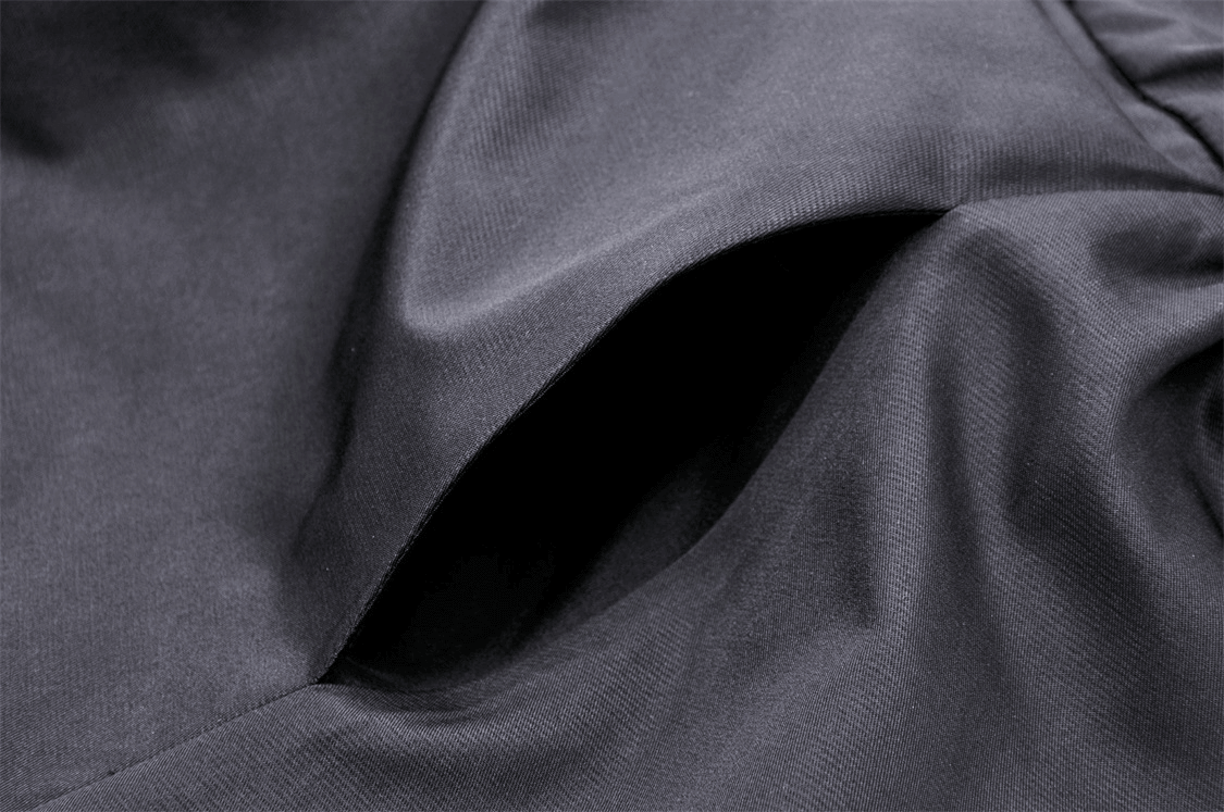 Close-up of the elegant black fabric of a Gothic A-Line long skirt, showcasing its smooth texture and flowing design.