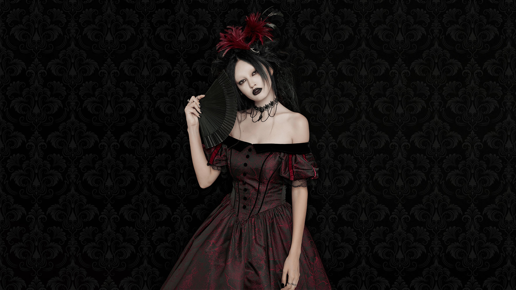 Elegant gothic ball gown with off-shoulder design, lace accents, and dramatic fan, perfect for Victorian-inspired fashion.