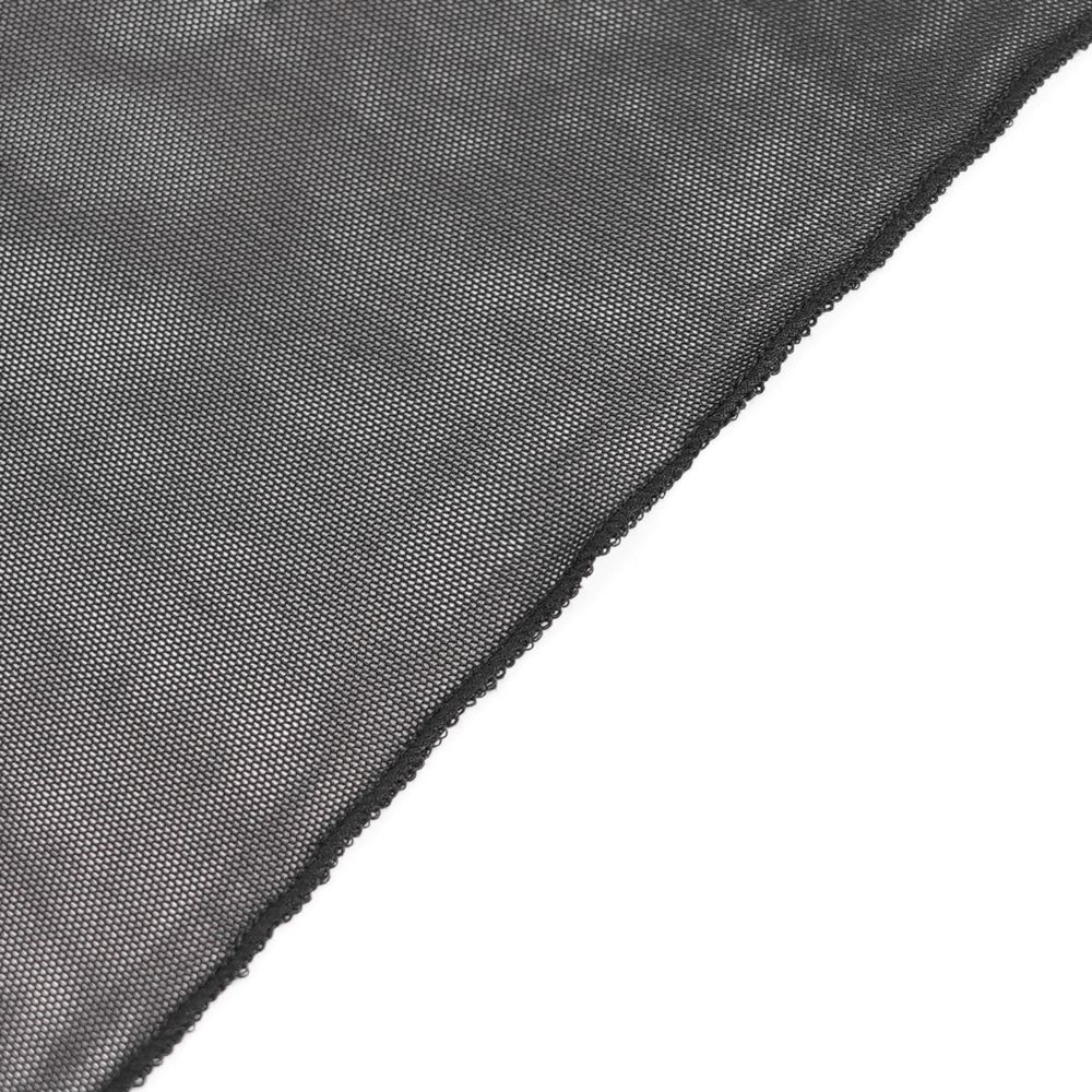 Close-up of elegant black lace fabric with scalloped edge, perfect for gothic inspired fashion and styling.