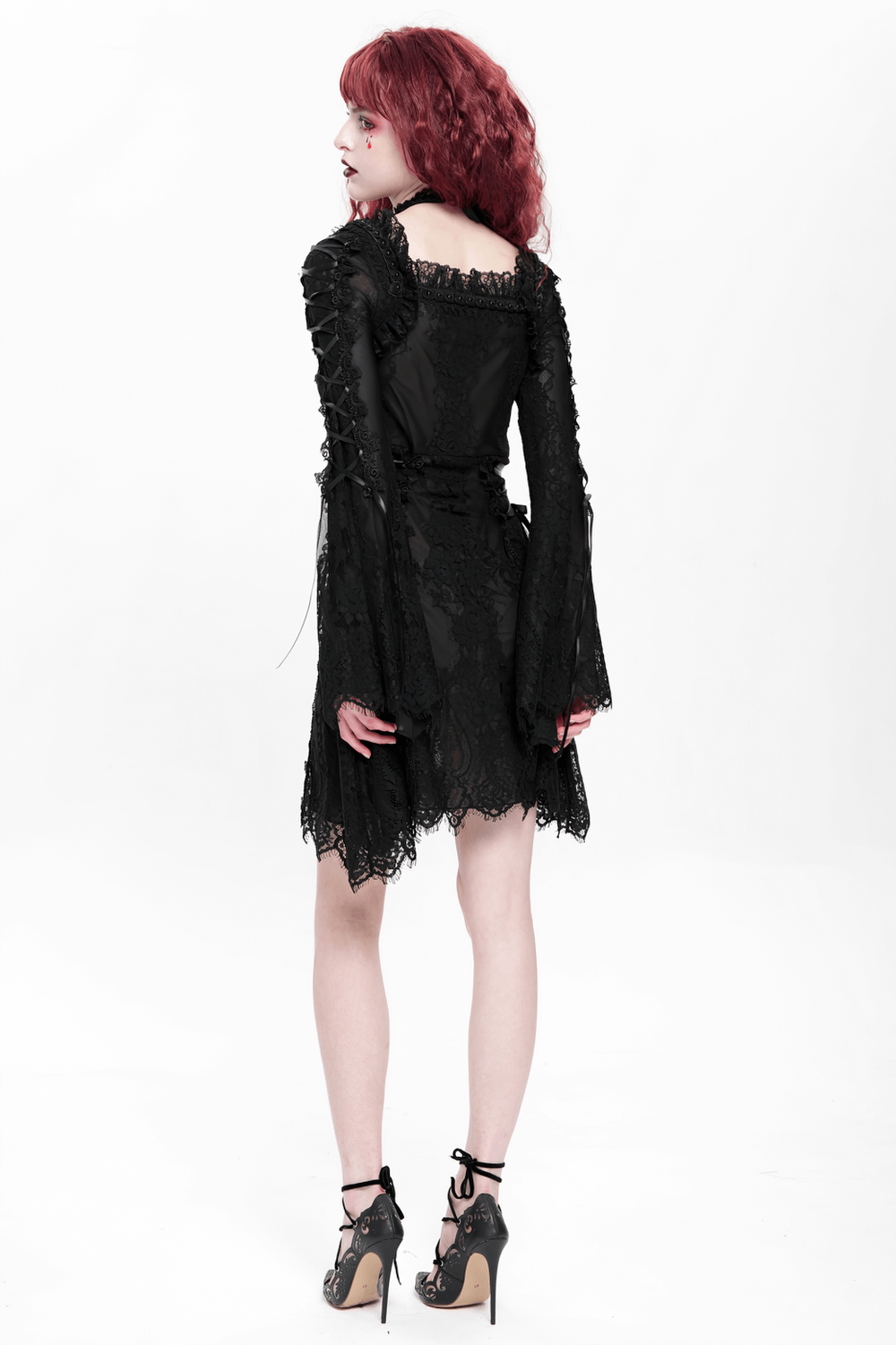 Elegant Gothic black lace mini dress with flared, sheer sleeves and lace-up details, showcasing dark romance.
