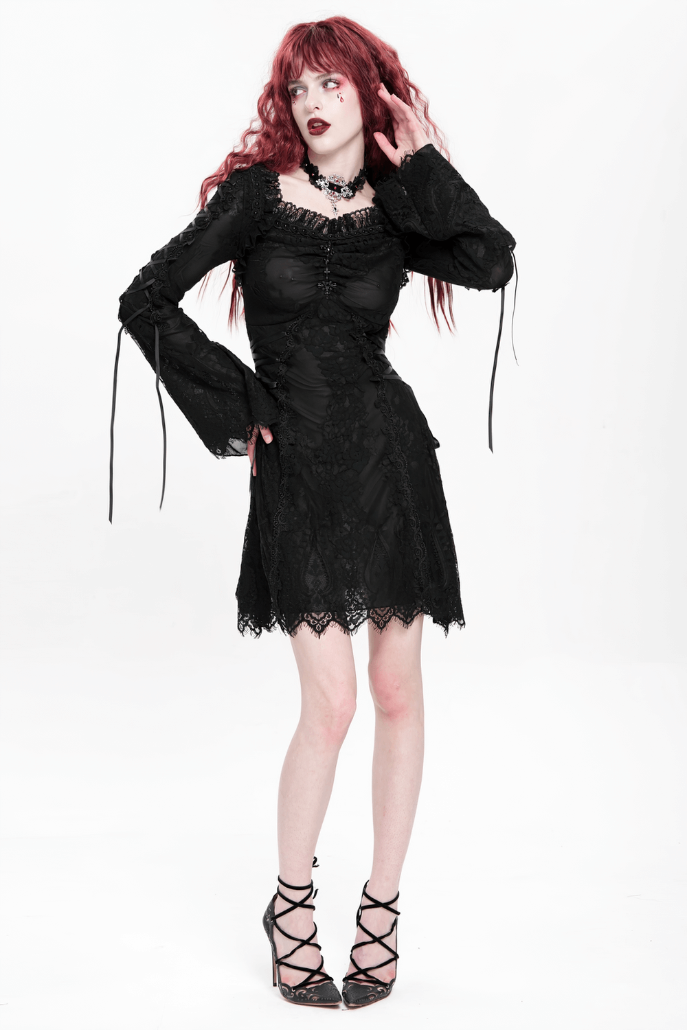 Elegant Gothic black lace mini dress with flared sleeves, perfect for romantic goth fashion.